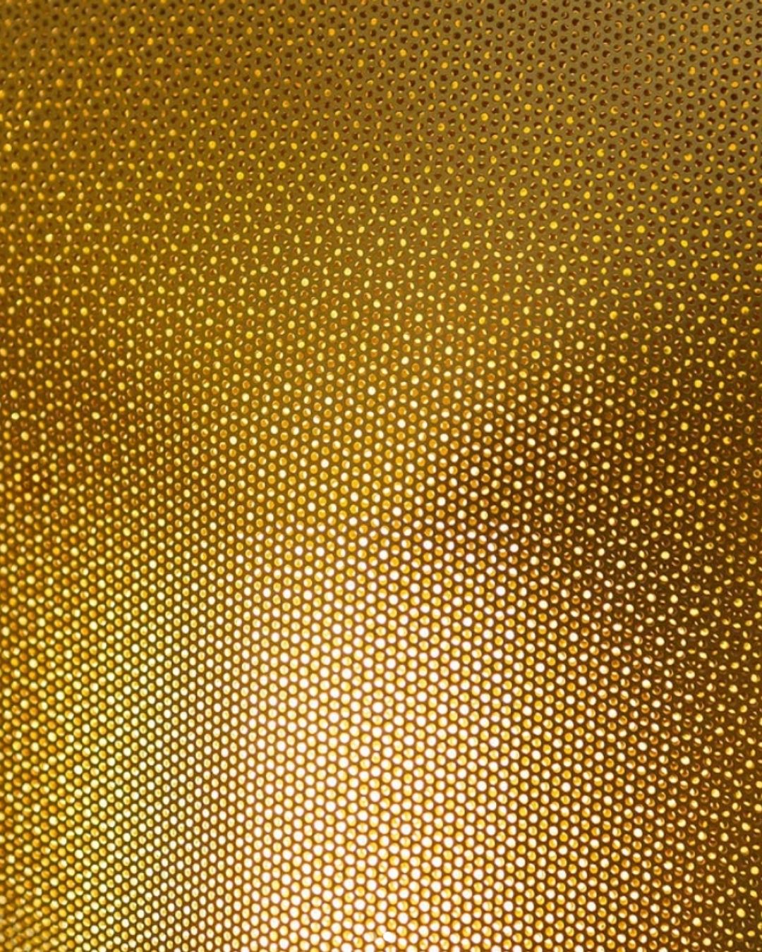 Photographie zoom sur une lampe doré credit: Gaelle Benoit Caslot